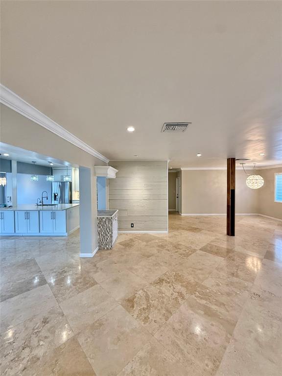 2524 Southeast 9th Street Pompano Beach, FL 33062 - Photo 8 of 45 a view of a kitchen with a sink and a refrigerator
