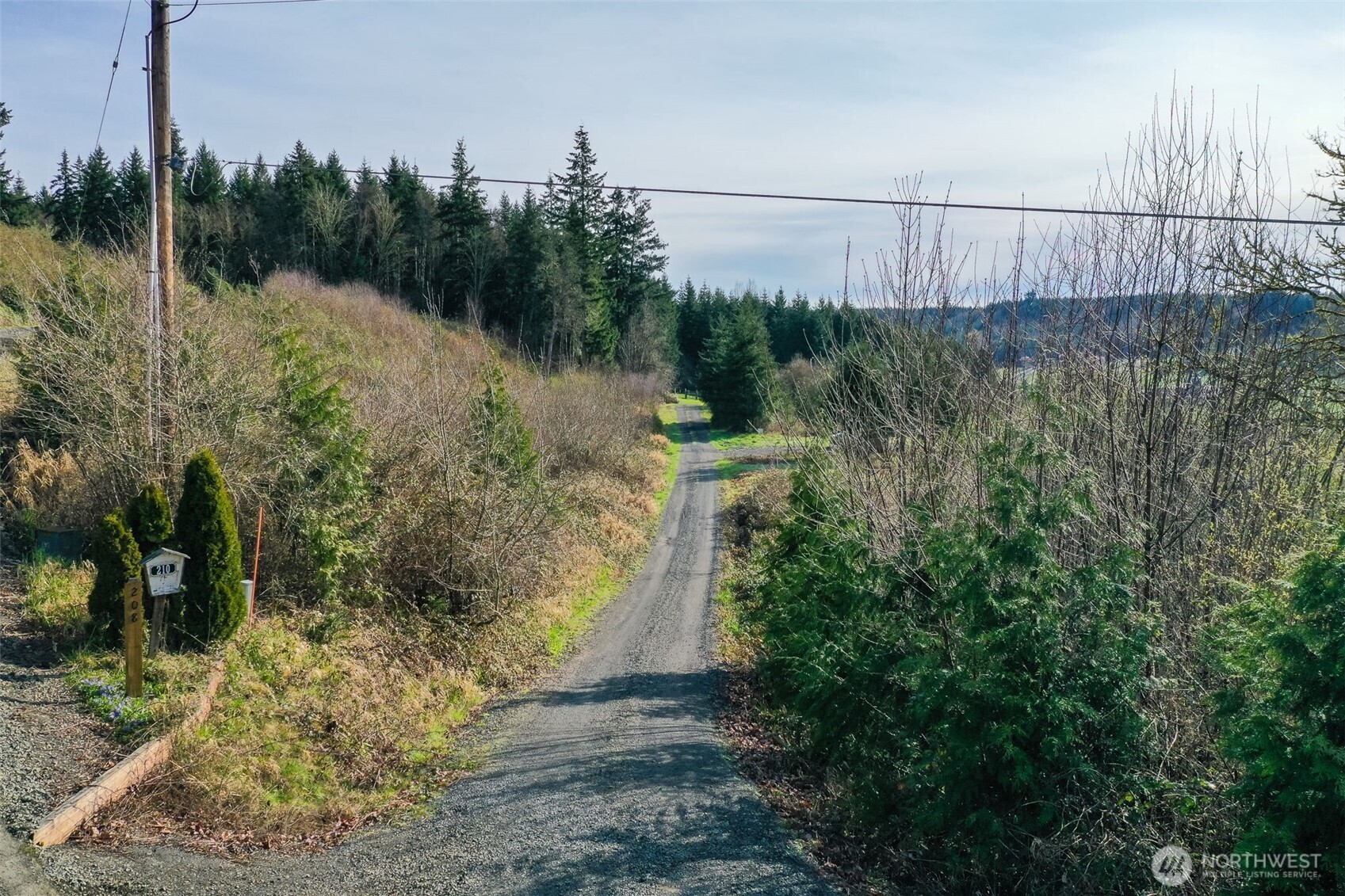 208 Sanderson Road Chehalis, WA 98532 - Photo 11 of 28 a view of a yard with wooden fence