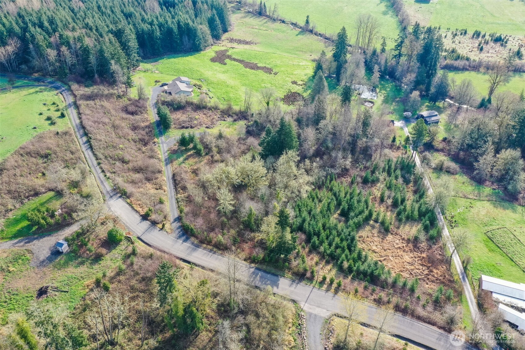 208 Sanderson Road Chehalis, WA 98532 - Photo 13 of 28 a view of a lake with a house