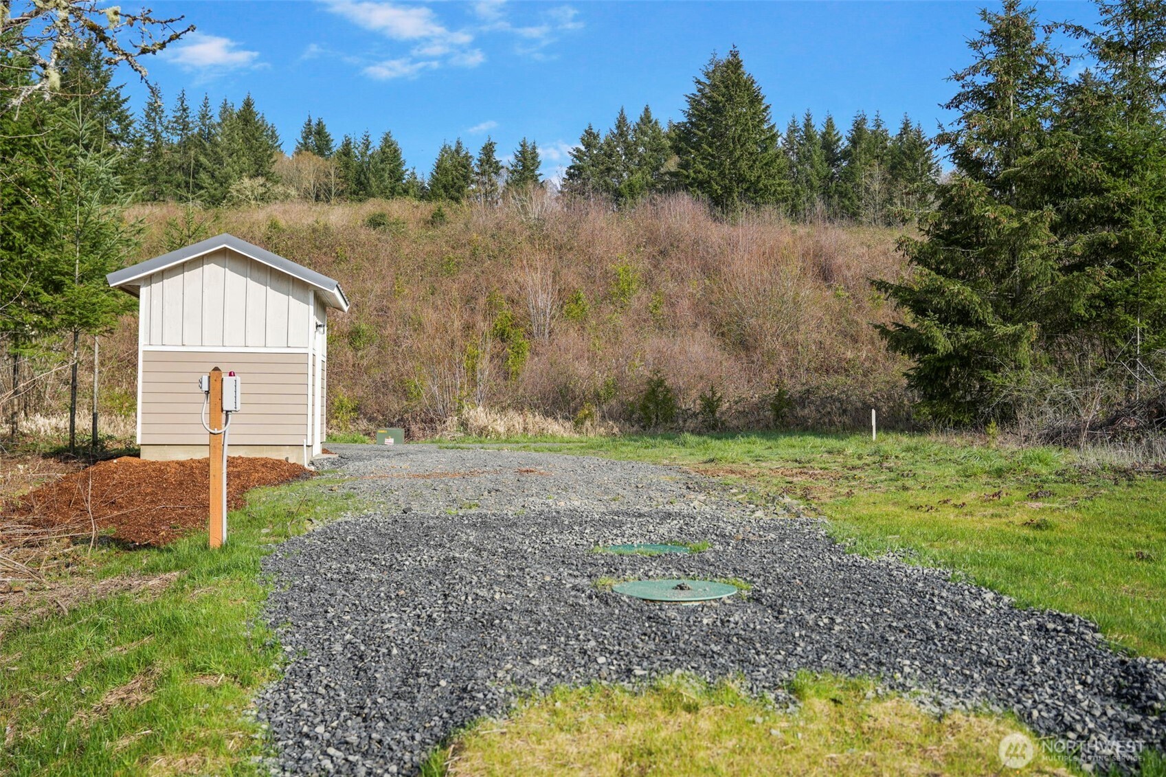 208 Sanderson Road Chehalis, WA 98532 - Photo 4 of 28 a view of a house with a yard and tree s