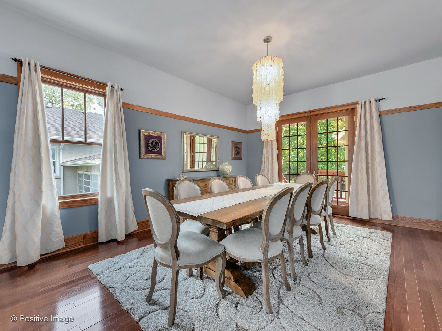 133 Scottswood Road Riverside, IL 60546 - Photo 8 of 38 a view of a dining room with furniture window and wooden floor