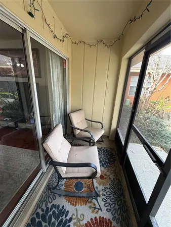 a living room with a rug