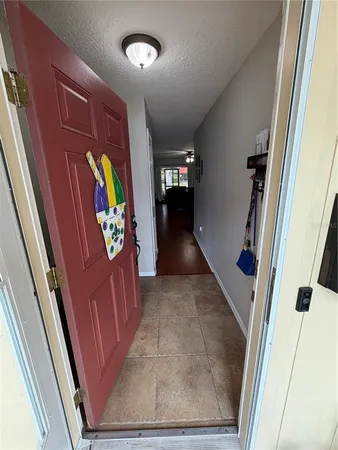 a view of a hallway with entryway