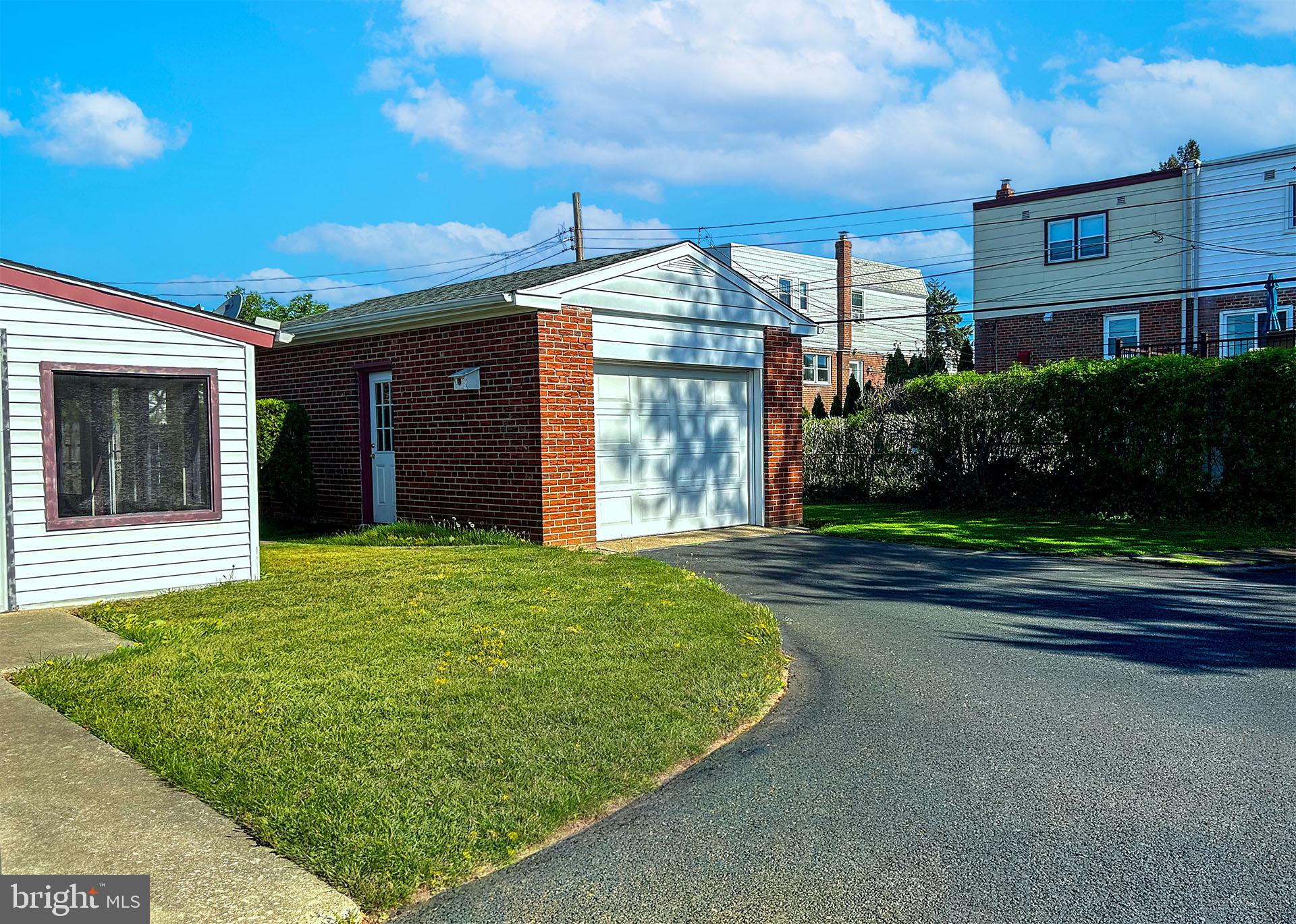 2125 Lott Avenue Philadelphia, PA 19115 - Photo 6 of 21 Charming brick garage in serene setting.