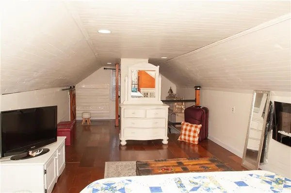 a view of a bathroom with a sink and a window