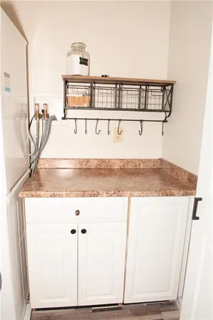 a bathroom with a sink vanity and a mirror