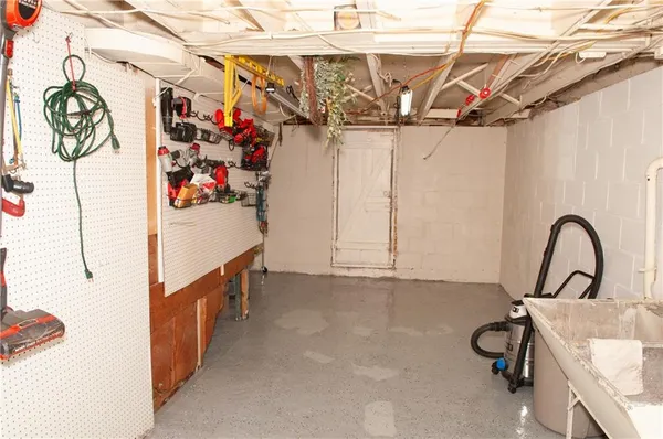 a view of entryway with a lot of stuff and furniture