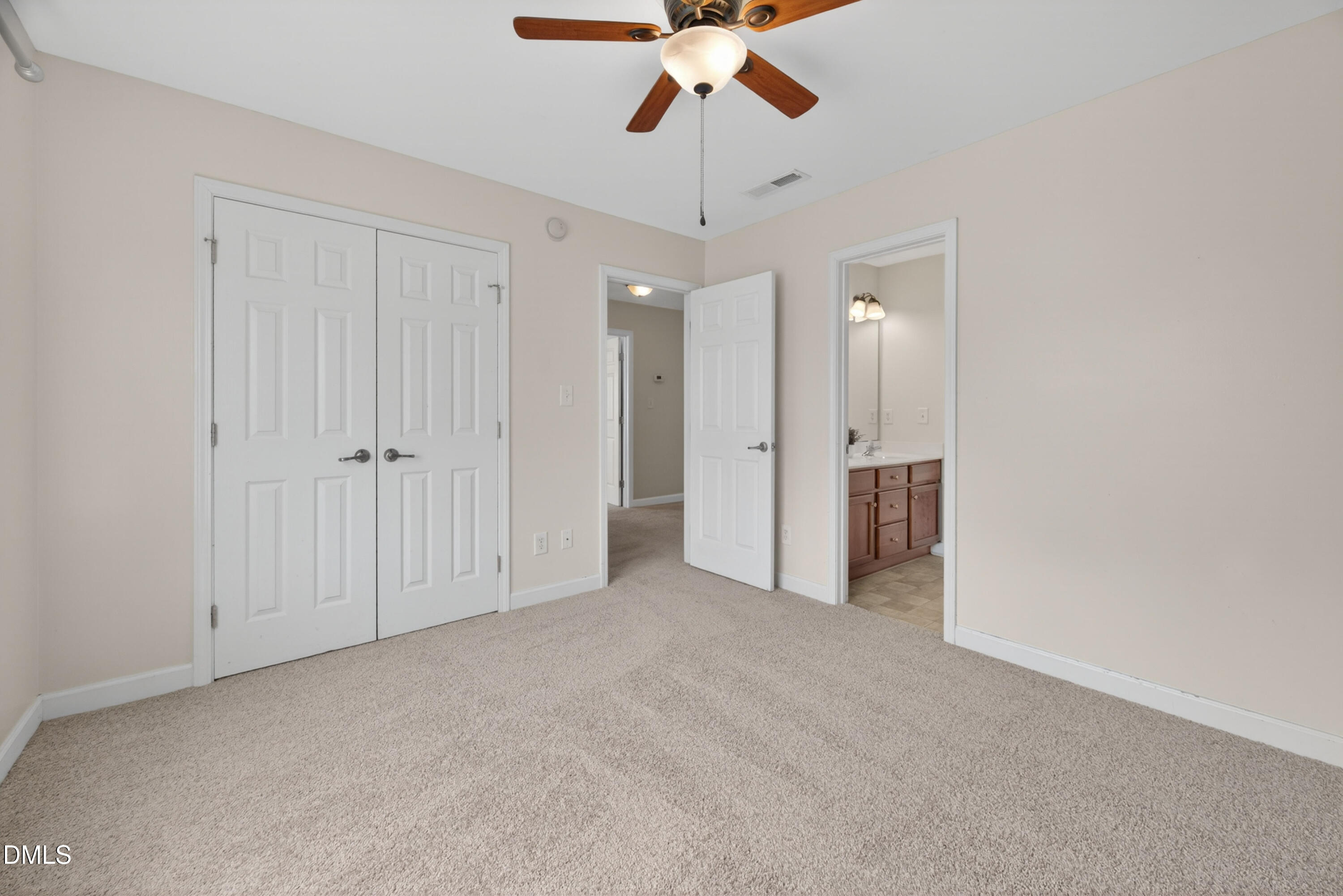 5304 Stone Station Drive Raleigh, NC 27616 - Photo 18 of 34 an empty room with chandelier fan