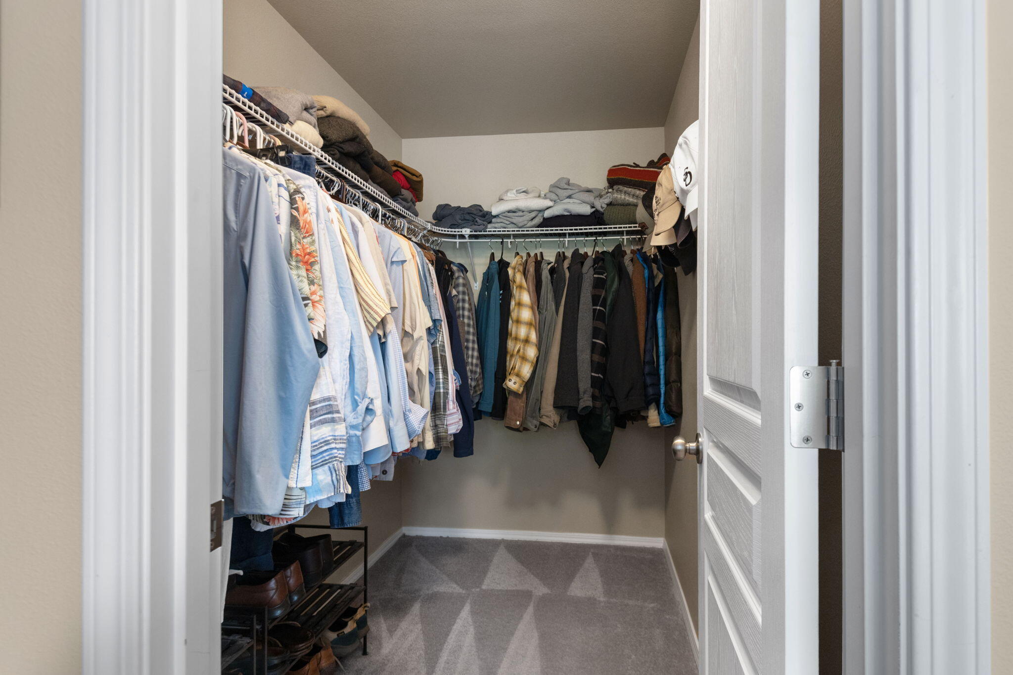 720 North Hindeman Street Sisters, OR 97759 - Photo 12 of 25 a view of walk in closet with clothes and shoes
