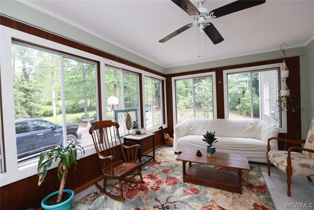 2000 Camborne Road Chesterfield, VA 23236 - Photo 18 of 44 Three season porch featuring a ceiling fan and natural light