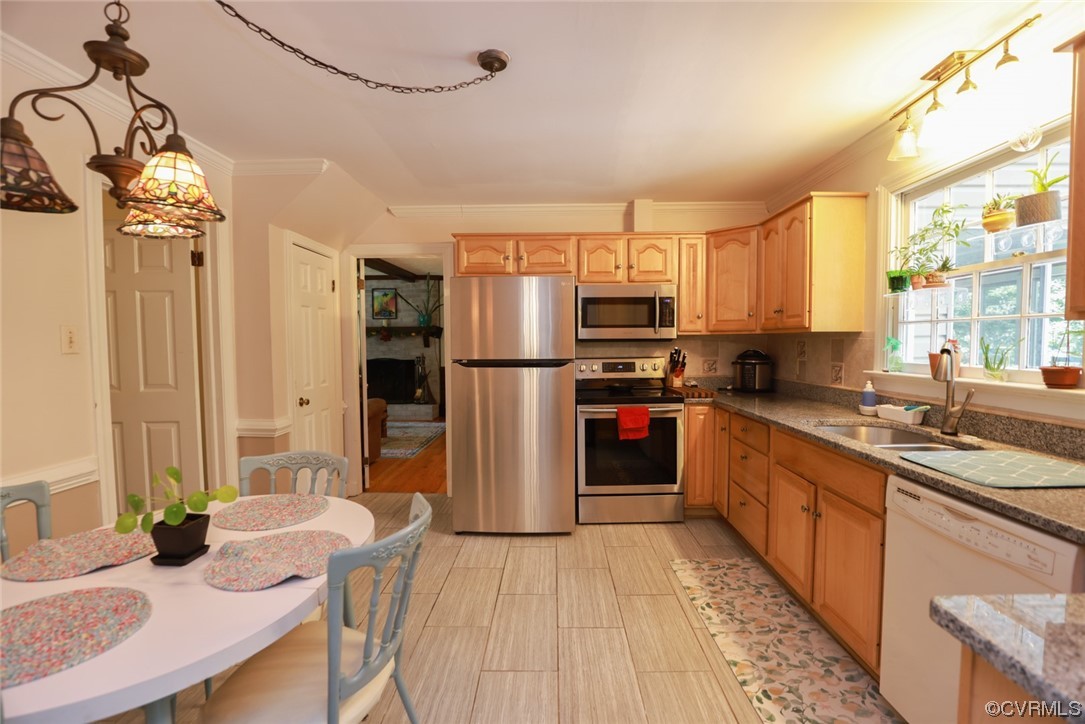 2000 Camborne Road Chesterfield, VA 23236 - Photo 8 of 44 Kitchen with natural light, stainless steel refrigerator, range oven, dishwasher, microwave, and light floors