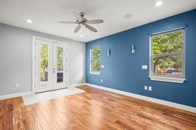a view of an empty room with a window