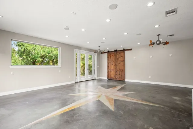 a view of room with racks on the wall