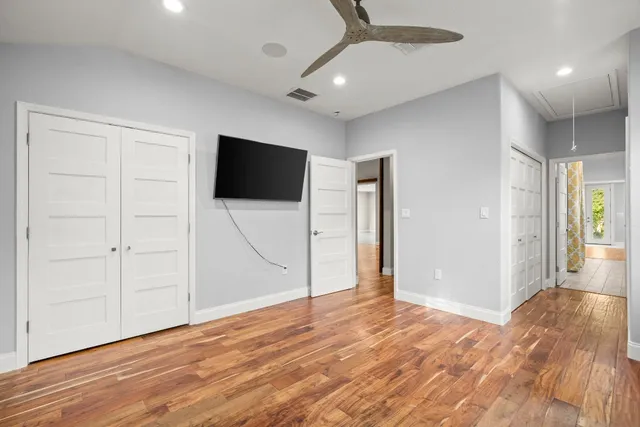 a view of a livingroom with wooden floor
