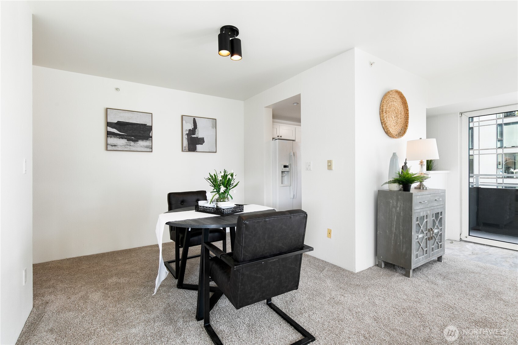 1415 2nd Avenue, Unit 1607 Seattle, WA 98101 - Photo 11 of 40 a workspace with furniture and window