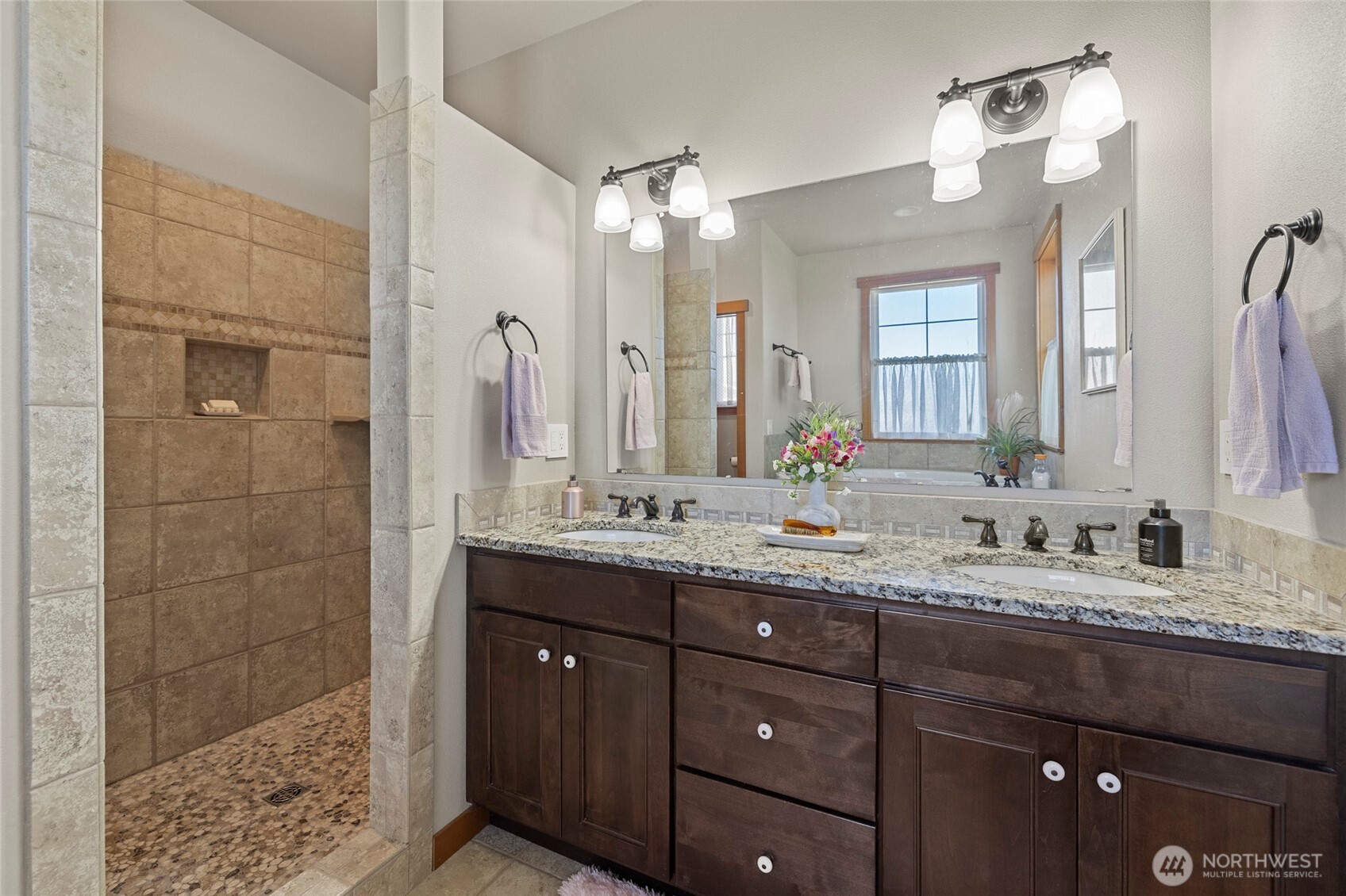 1739 Emerald Way Lynden, WA 98264 - Photo 18 of 40 a bathroom with a granite countertop sink mirror and double