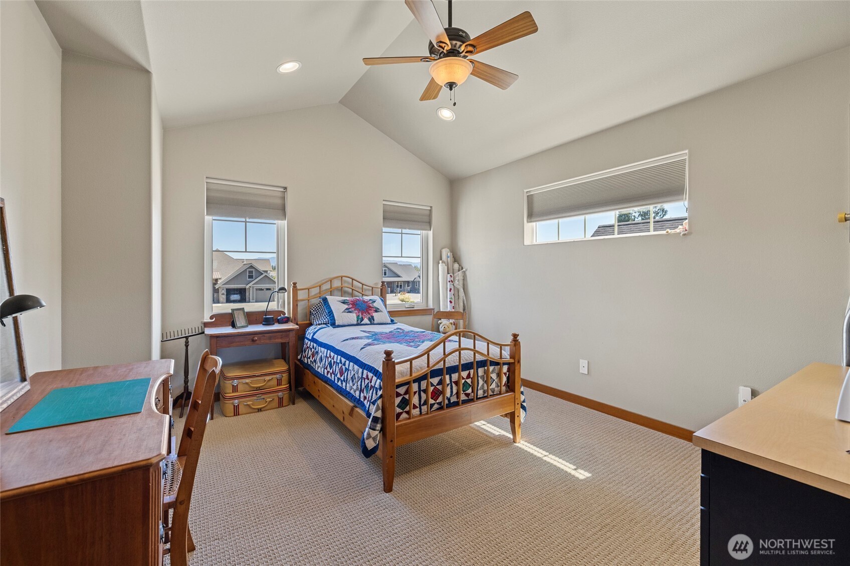 1739 Emerald Way Lynden, WA 98264 - Photo 20 of 40 a bedroom with a bed window and a table