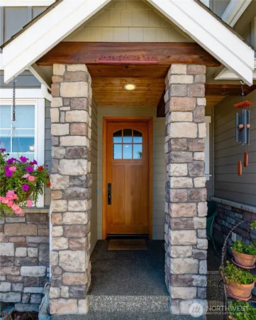 a front view of a house with a porch