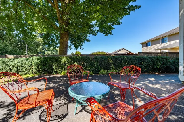 an aerial view of a house with a swimming pool