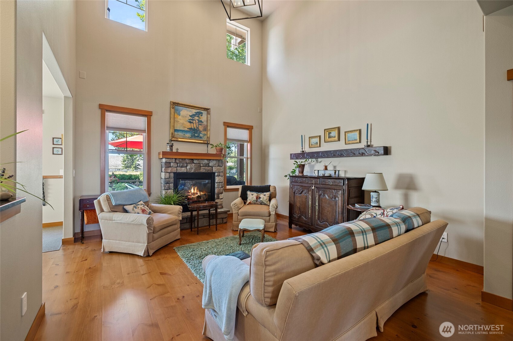 1739 Emerald Way Lynden, WA 98264 - Photo 6 of 40 a living room with furniture and a fireplace