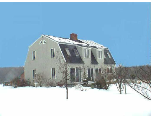 5 Upland Road Ipswich, MA 01938 - Photo 1 of 10 a view of a house with snow