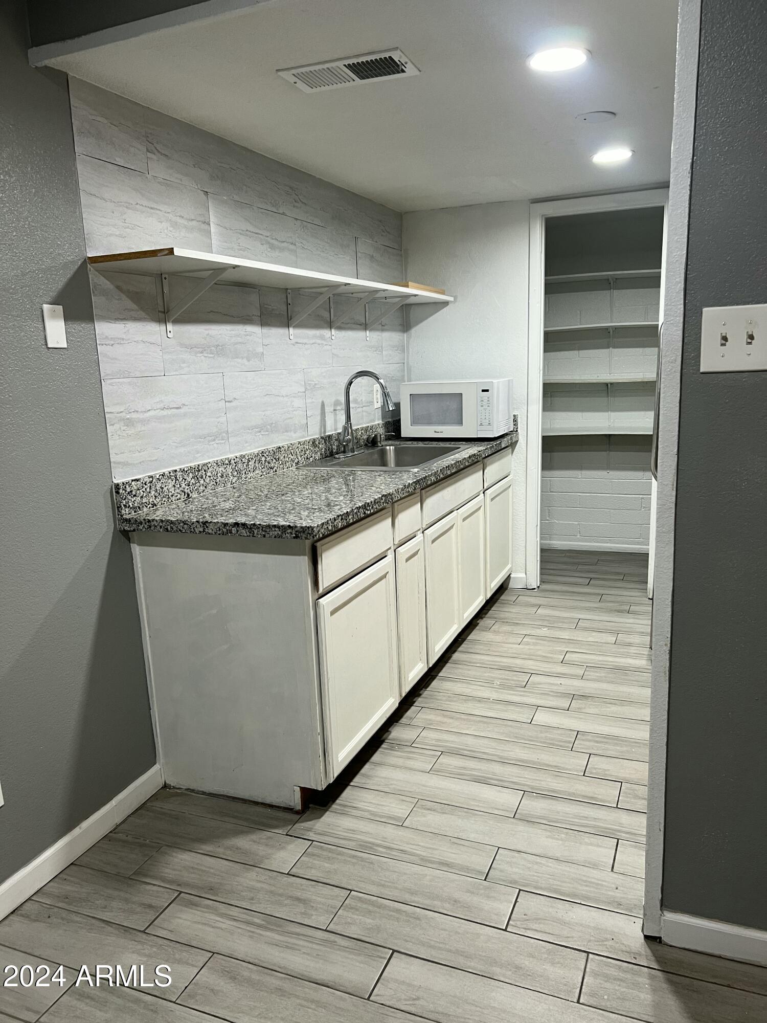 3942 West Palomino Road Phoenix, AZ 85019 - Photo 4 of 14 Kitchen/ Pantry