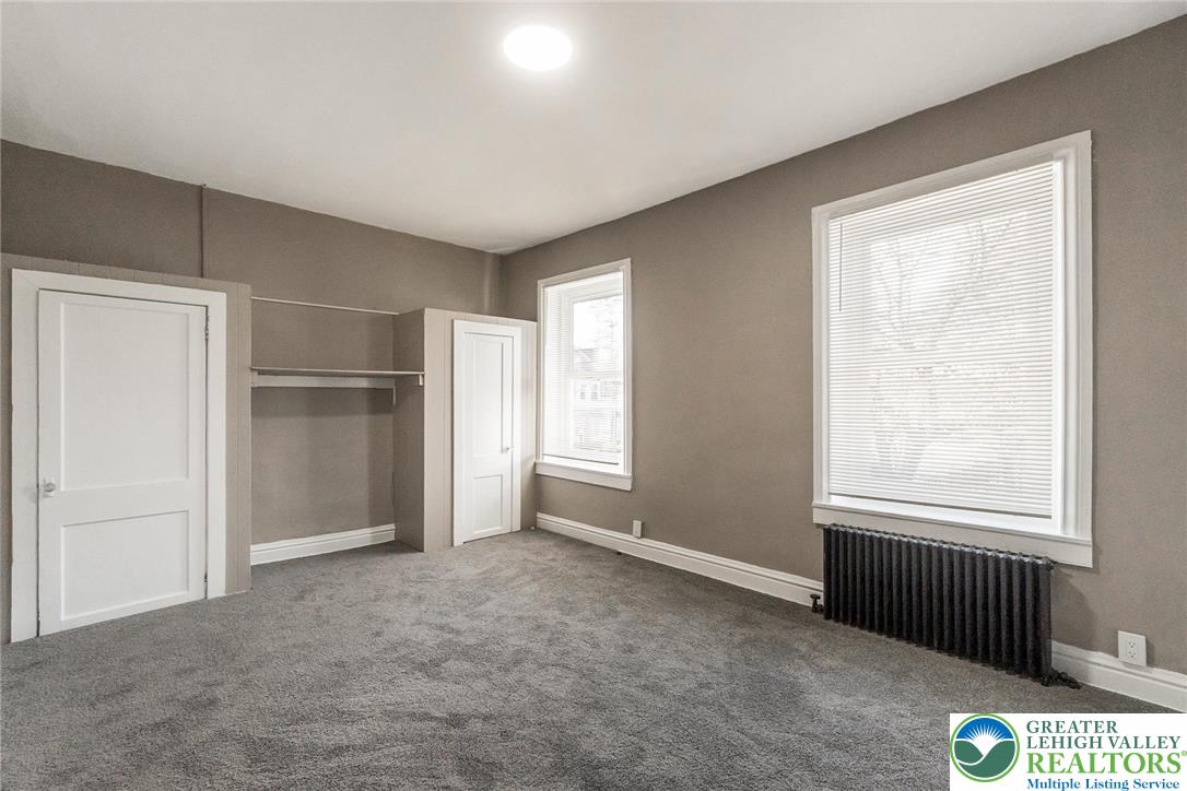 2213 Village Road Orefield, PA 18069 - Photo 8 of 41 a view of an empty room with a window
