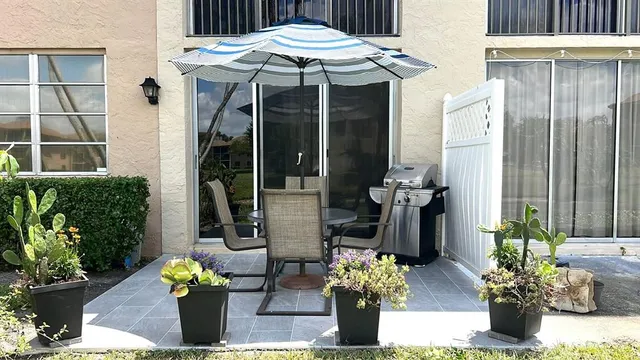 a front view of a house with patio