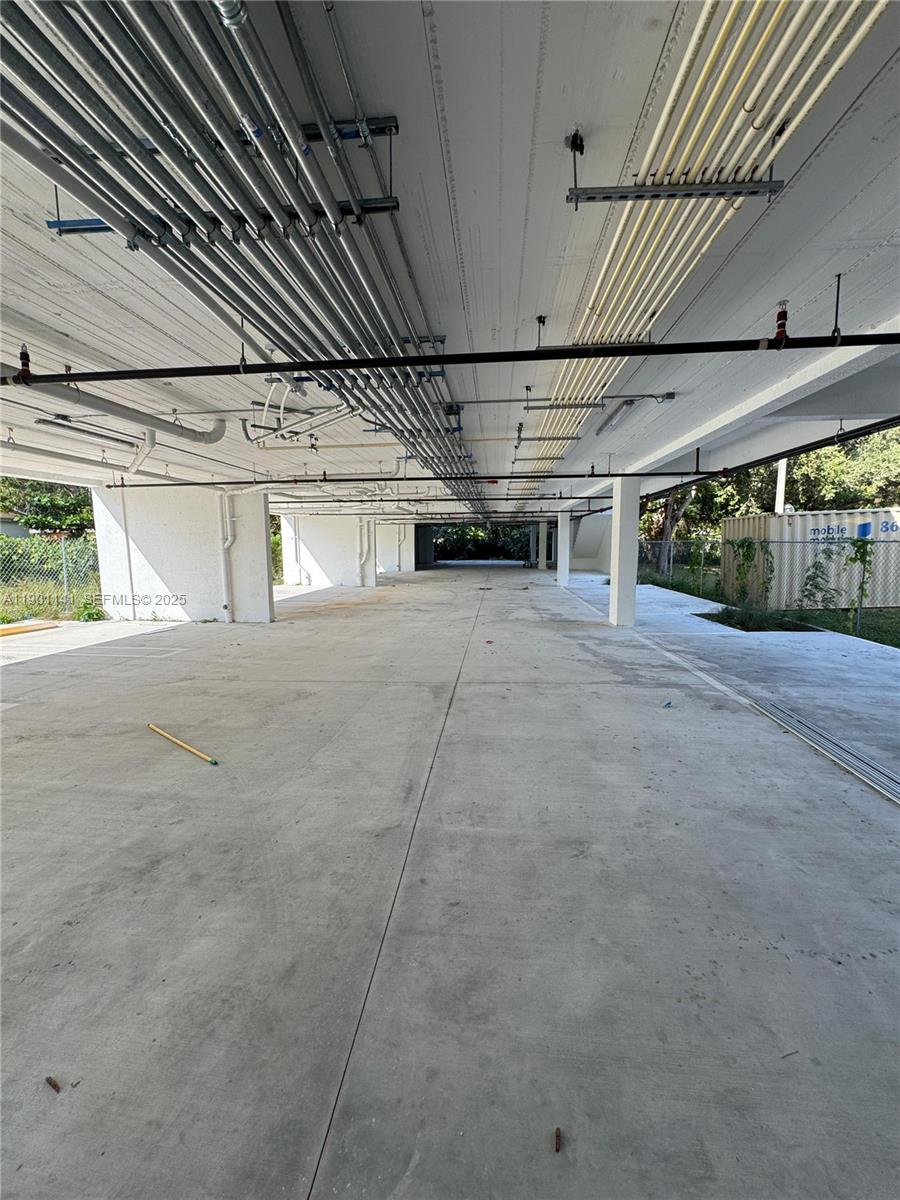 147 Northwest 59th Street, Unit 302 Miami, FL 33127 - Photo 3 of 10 a view of a garage