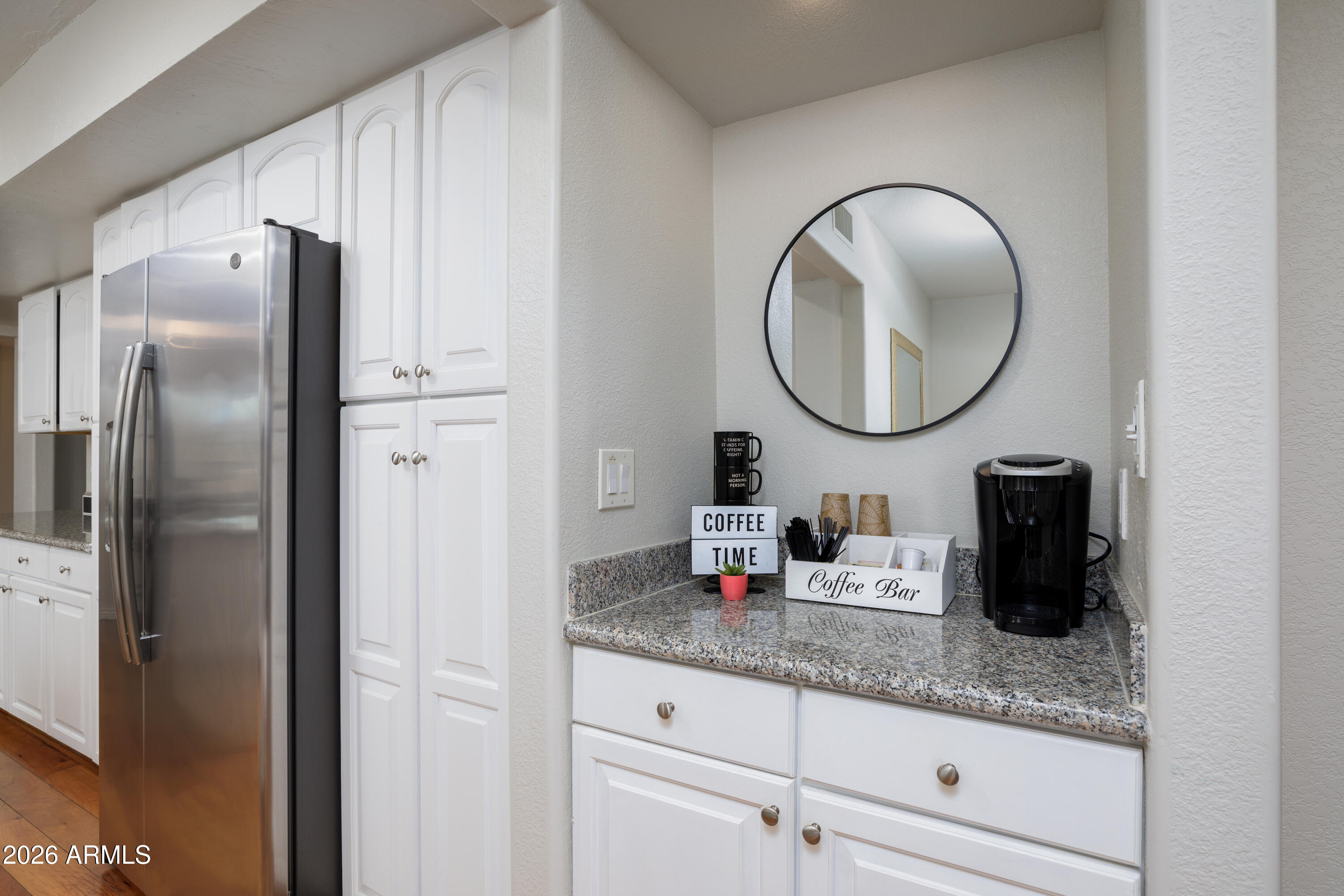 6932 East Presidio Road Scottsdale, AZ 85254 - Photo 16 of 30 a bathroom with a granite countertop double vanity sink and a mirror