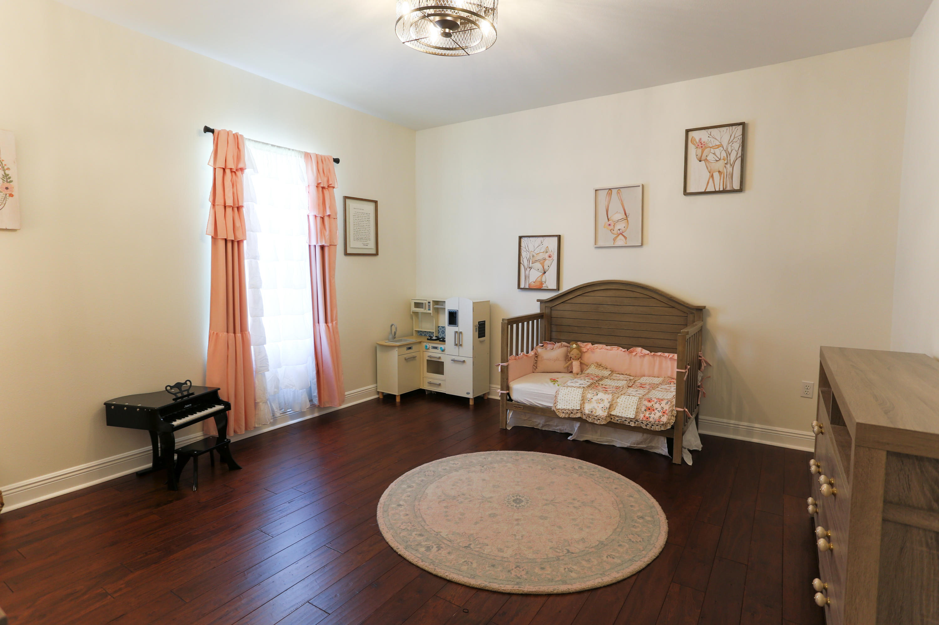 121 Concert Court Freeport, FL 32439 - Photo 22 of 33 a living room with furniture and a wooden floor