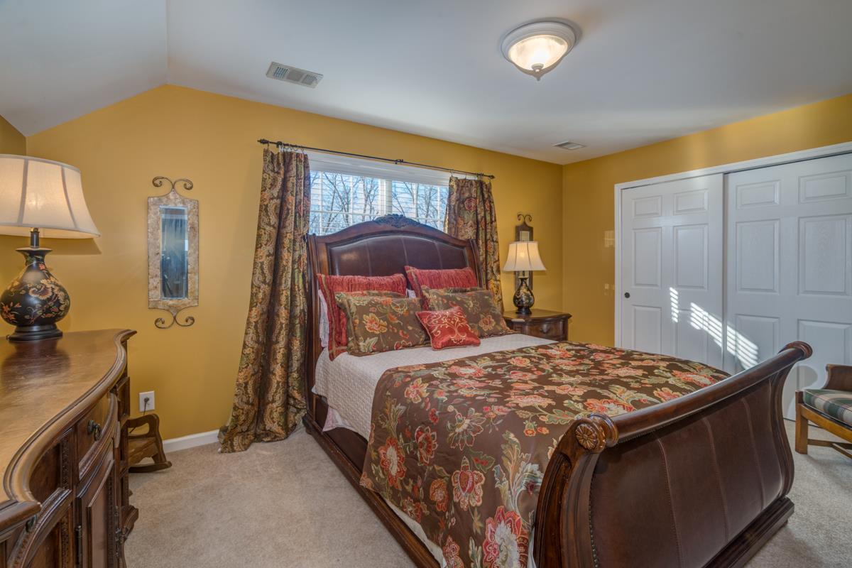 3537 Trimble Road Nashville, TN 37215 - Photo 27 of 29 a bedroom with a bed and a dresser
