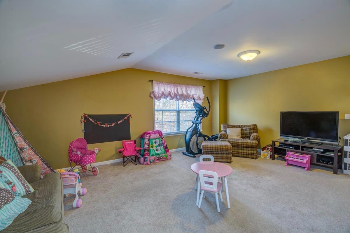 3537 Trimble Road Nashville, TN 37215 - Photo 28 of 29 a living room with furniture and a flat screen tv