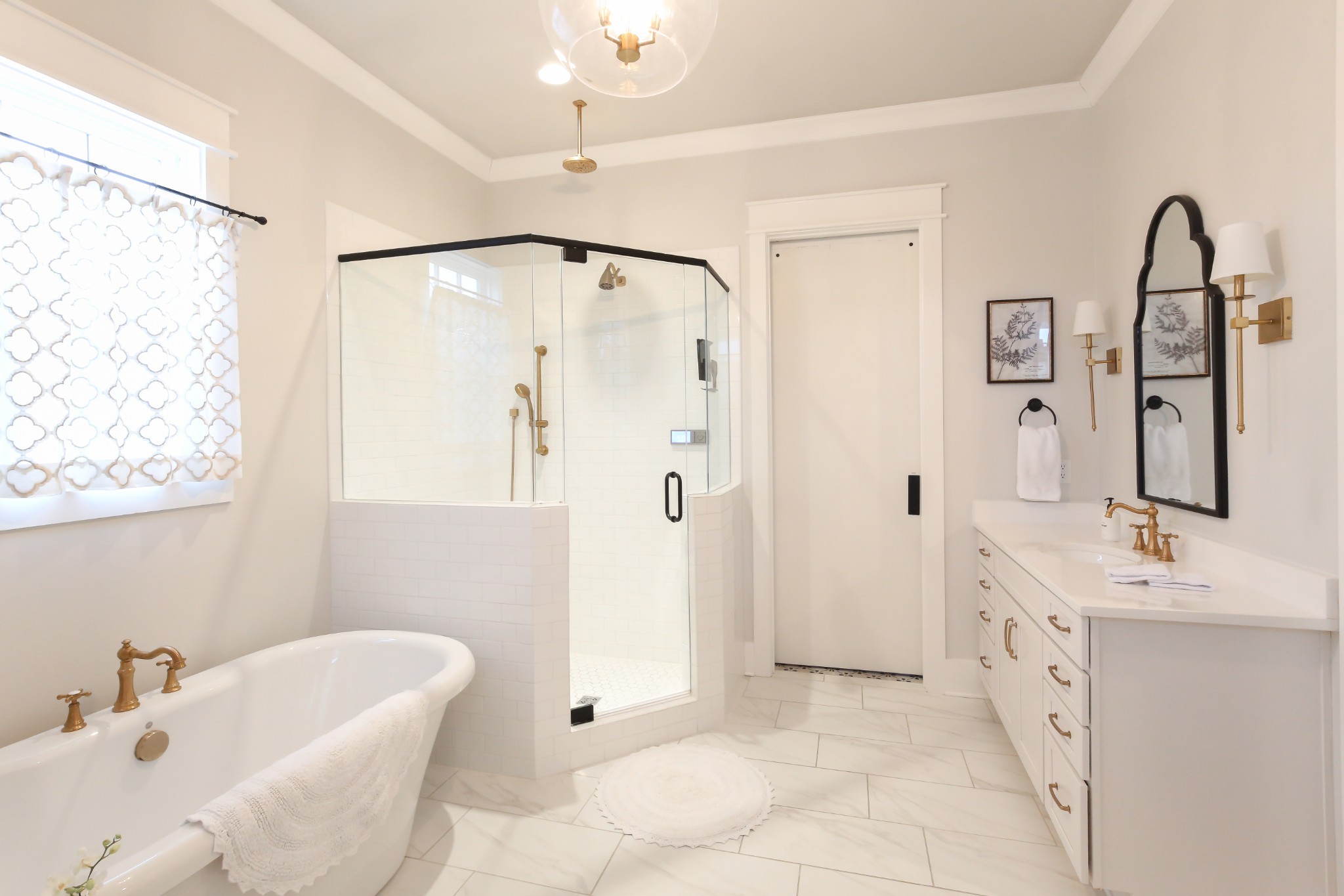237 Stephens Valley Boulevard Nashville, TN 37221 - Photo 13 of 34 a bathroom with a double vanity sink mirror and bathtub