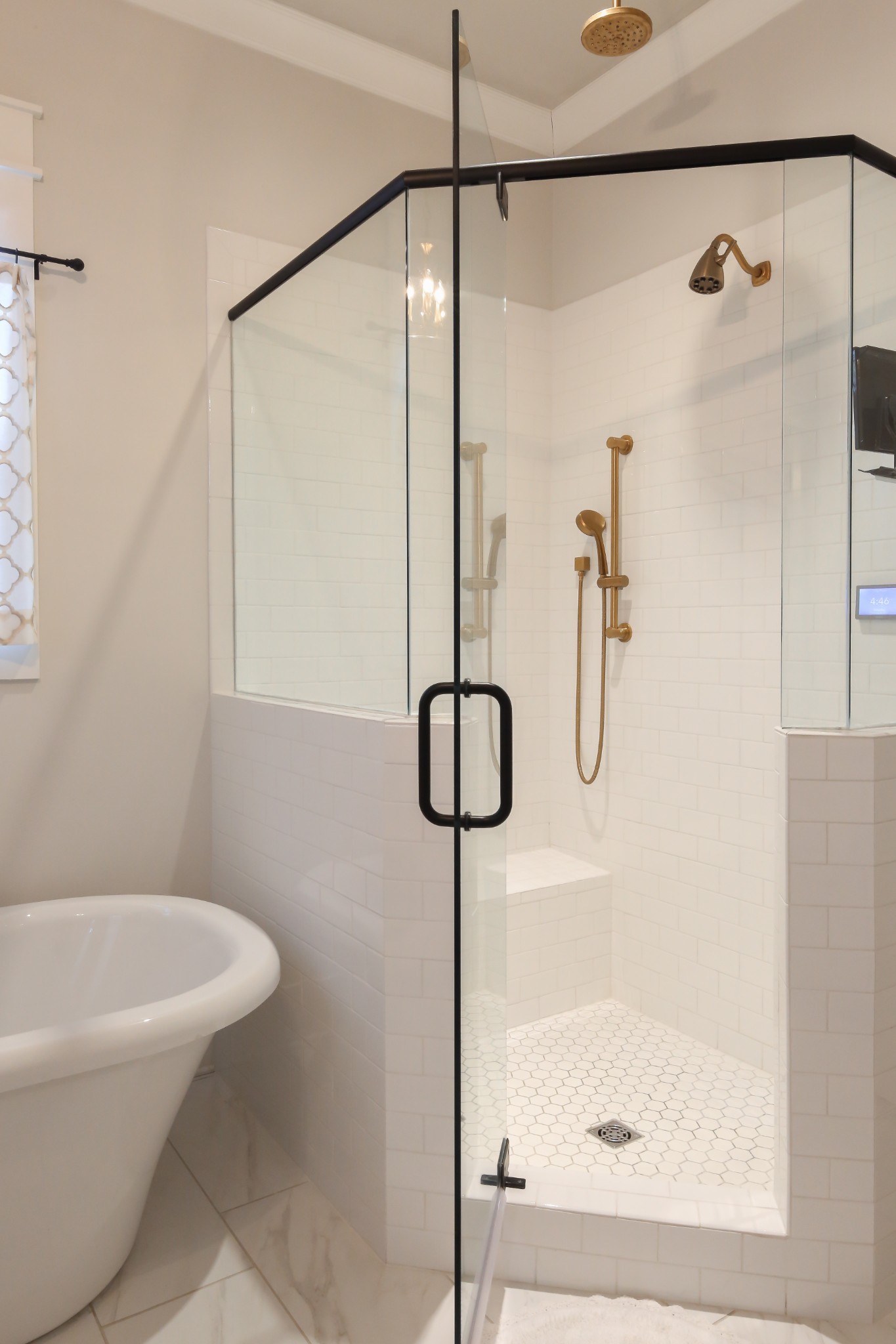 237 Stephens Valley Boulevard Nashville, TN 37221 - Photo 14 of 34 a bathroom with a shower and a bath tub