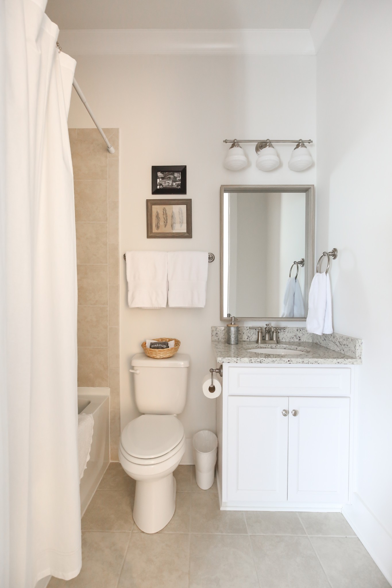 237 Stephens Valley Boulevard Nashville, TN 37221 - Photo 23 of 34 a bathroom with a granite countertop toilet sink and mirror