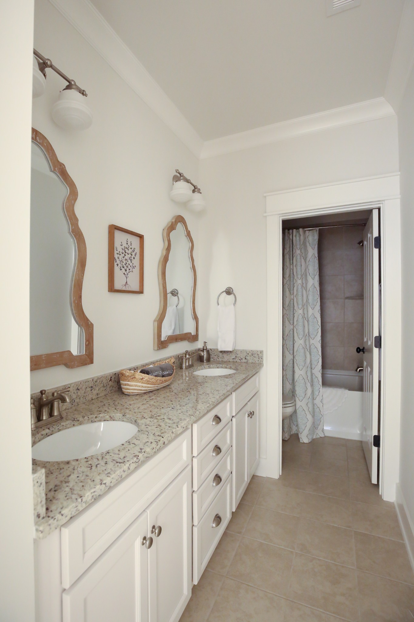 237 Stephens Valley Boulevard Nashville, TN 37221 - Photo 25 of 34 a bathroom with a granite countertop double vanity sink and mirror
