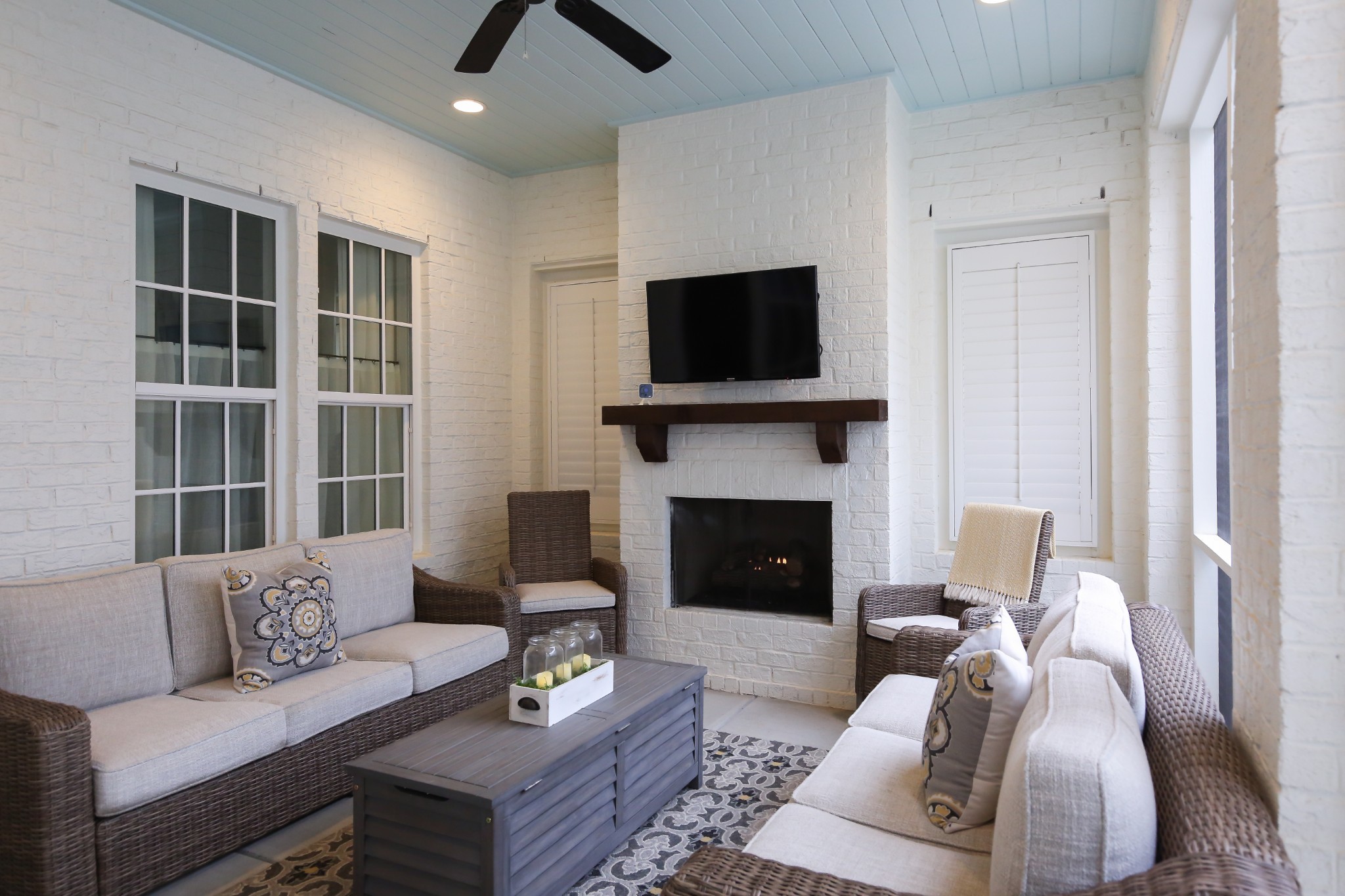 237 Stephens Valley Boulevard Nashville, TN 37221 - Photo 10 of 34 a living room with furniture a fireplace and a flat screen tv