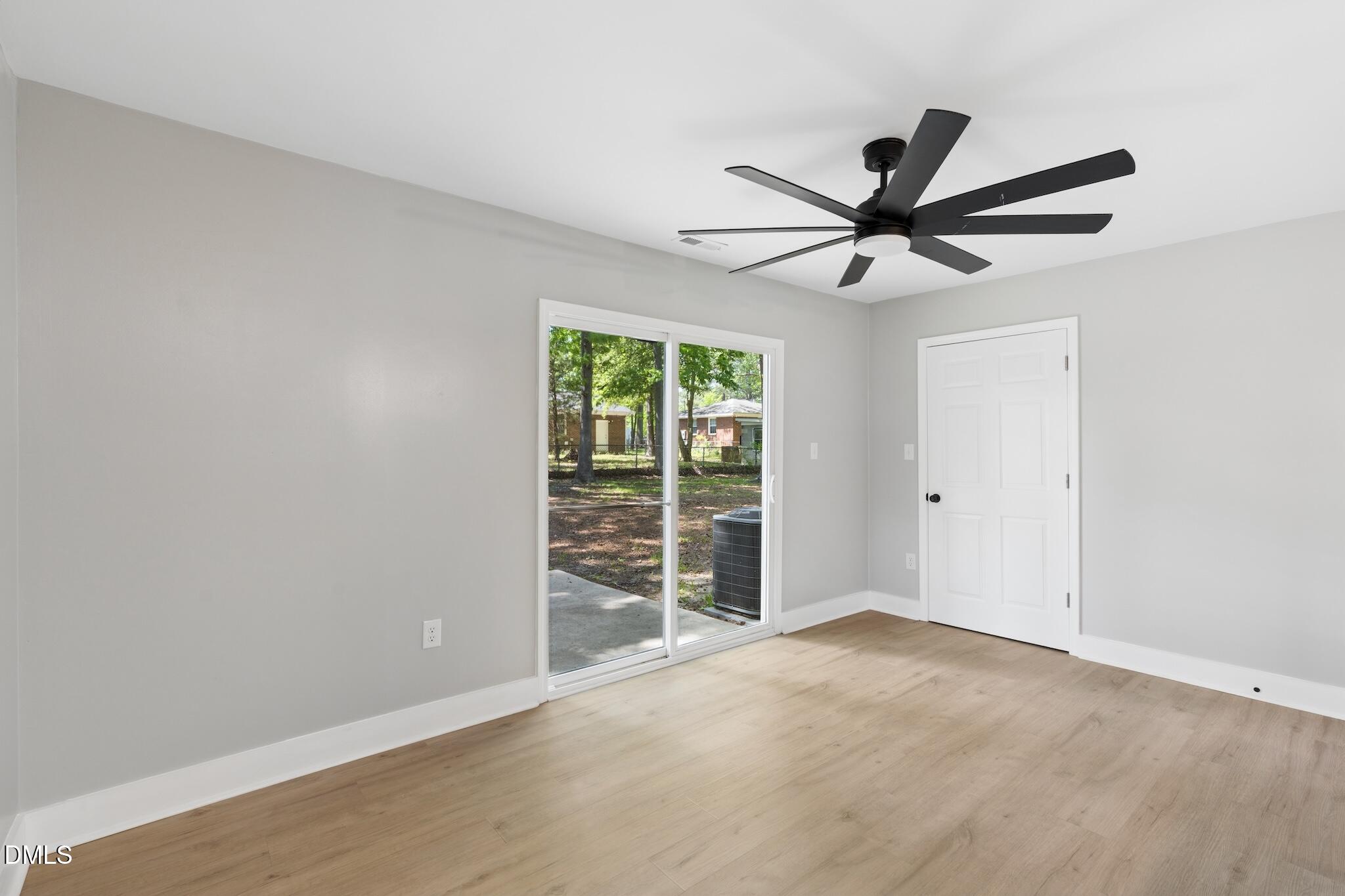 1200 Armstrong Circle Raleigh, NC 27610 - Photo 11 of 28 a view of a livingroom with a ceiling fan and a window