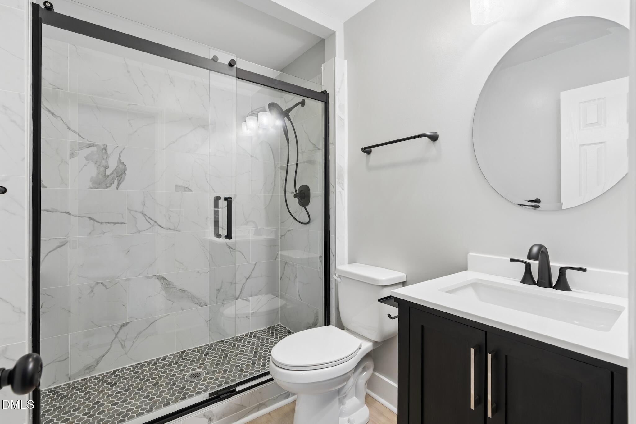 1200 Armstrong Circle Raleigh, NC 27610 - Photo 14 of 28 a bathroom with a sink toilet and shower