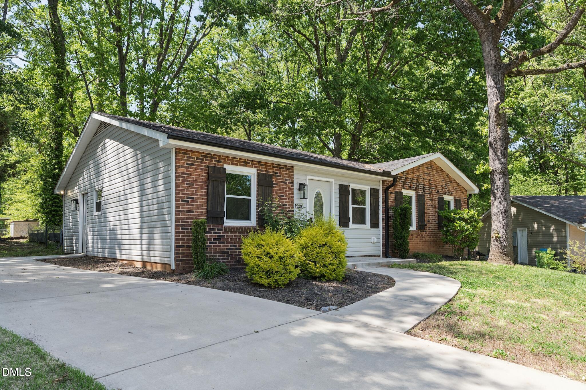 1200 Armstrong Circle Raleigh, NC 27610 - Photo 2 of 28 front view of a house with a yard