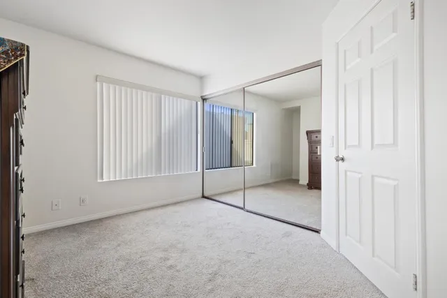a view of a livingroom with wooden floor