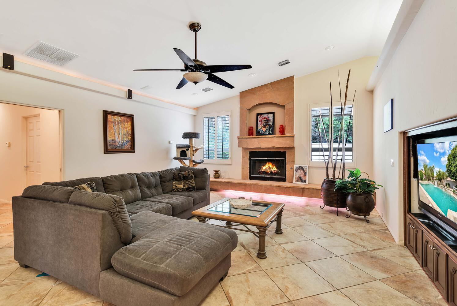 43920 Culebra Lane Bermuda Dunes, CA 92203 - Photo 11 of 66 a living room with furniture and a fireplace