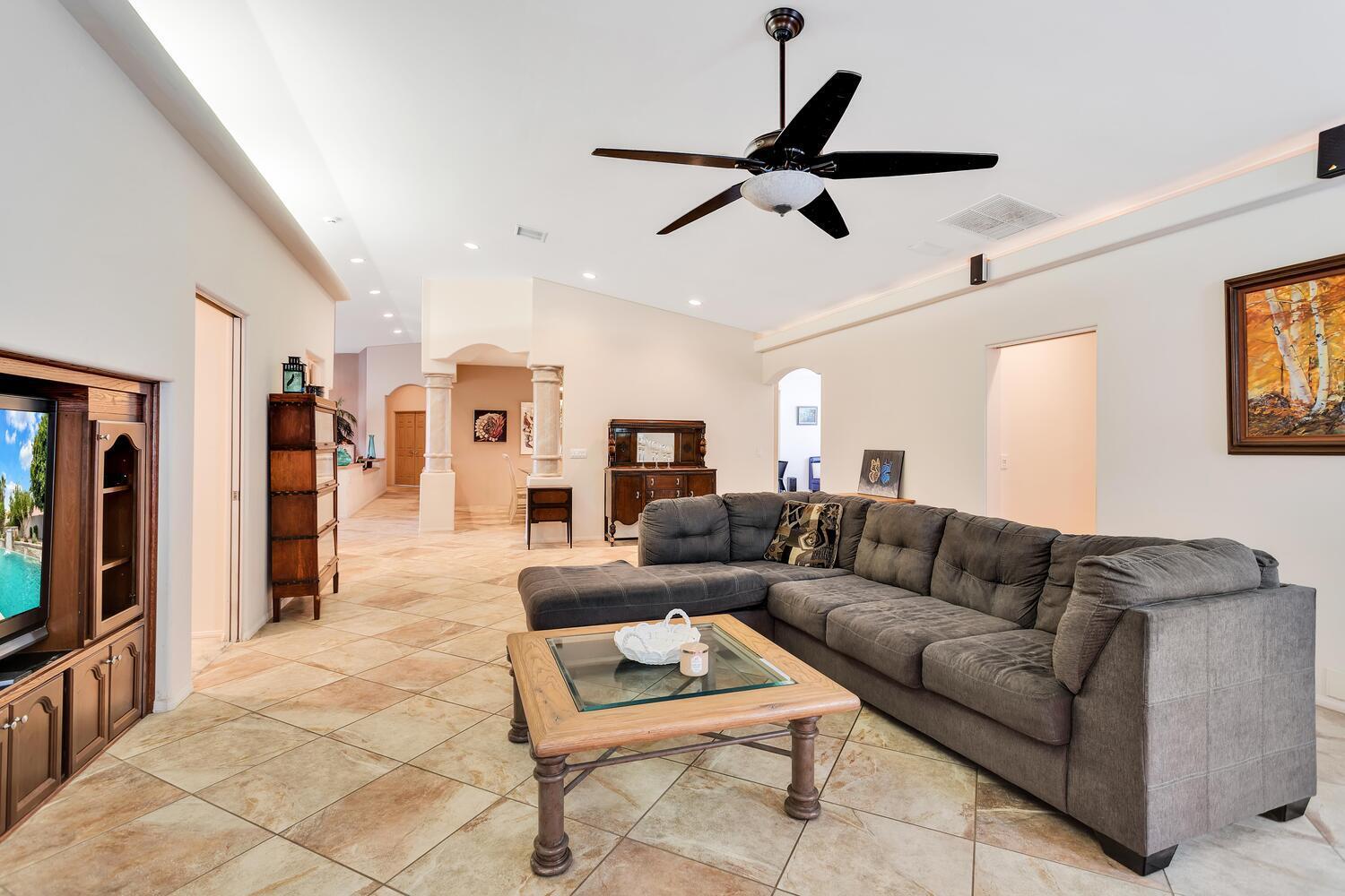 43920 Culebra Lane Bermuda Dunes, CA 92203 - Photo 13 of 66 a living room with furniture and a flat screen tv