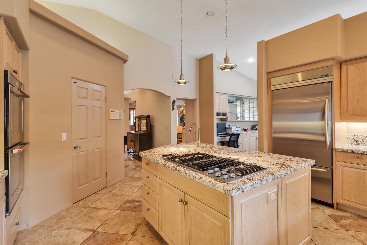 43920 Culebra Lane Bermuda Dunes, CA 92203 - Photo 17 of 66 a kitchen with a sink stove and refrigerator