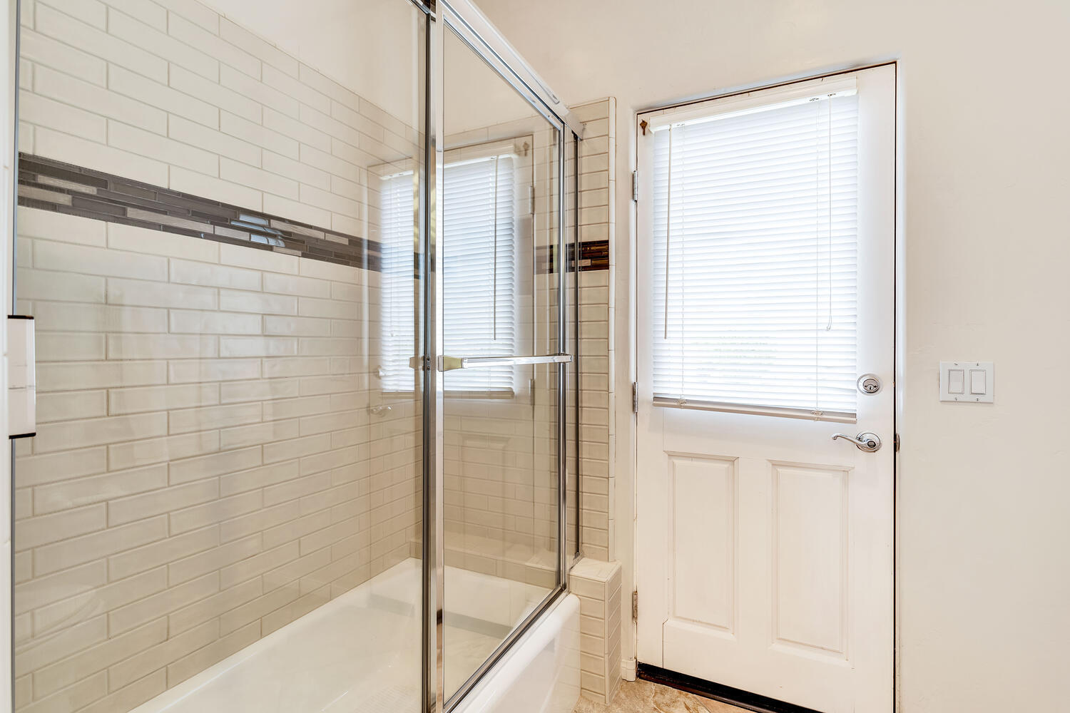 43920 Culebra Lane Bermuda Dunes, CA 92203 - Photo 31 of 66 a bathroom with a glass shower door