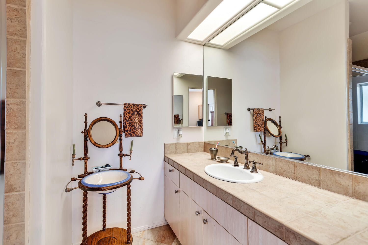 43920 Culebra Lane Bermuda Dunes, CA 92203 - Photo 34 of 66 a bathroom with a sink and a mirror