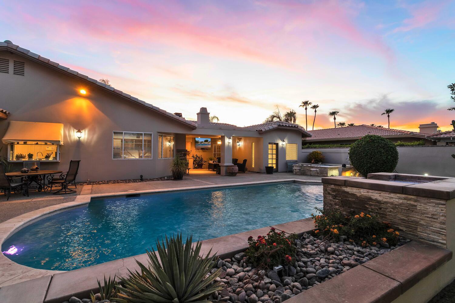 43920 Culebra Lane Bermuda Dunes, CA 92203 - Photo 4 of 66 a view of a house with backyard swimming pool and sitting area