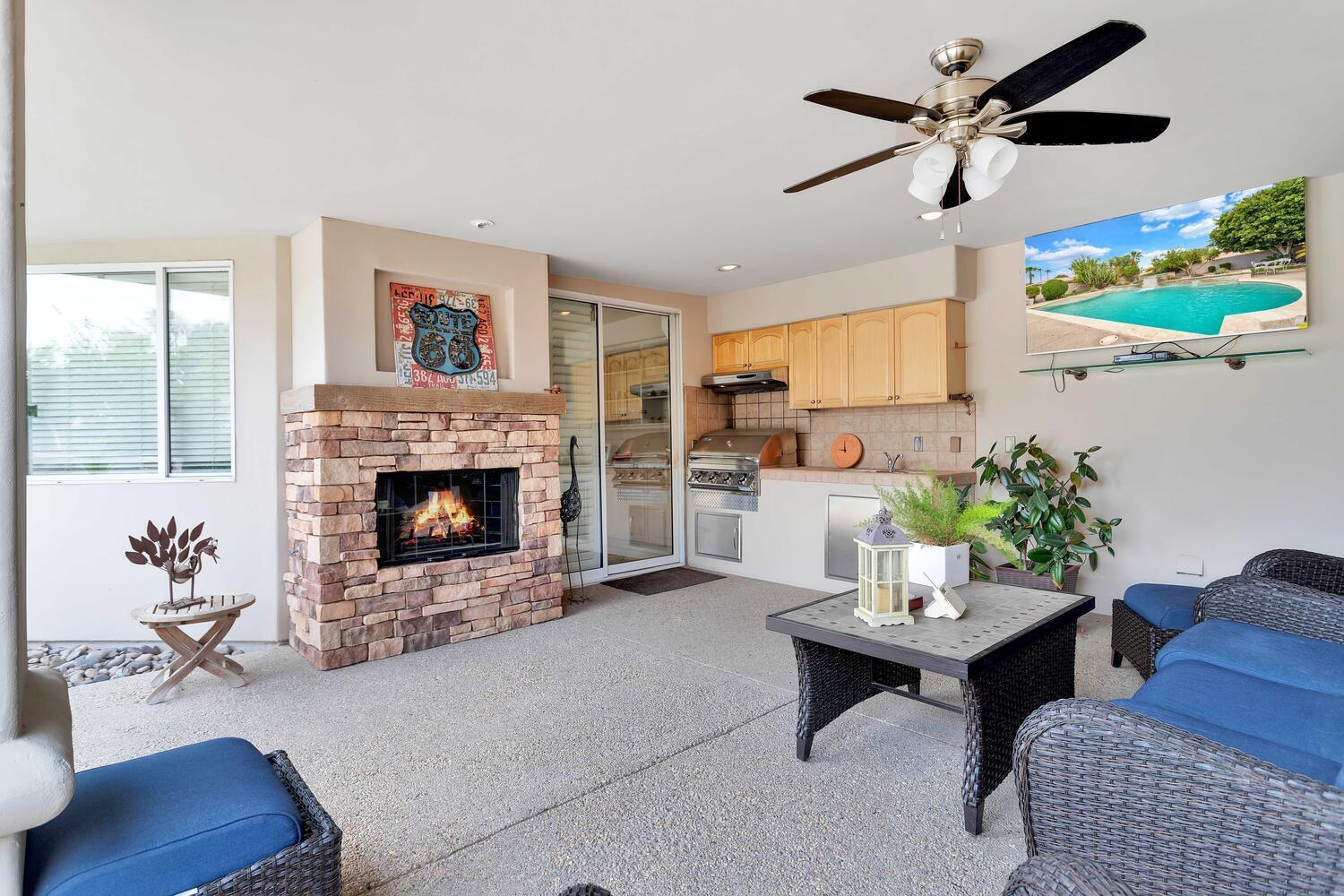 43920 Culebra Lane Bermuda Dunes, CA 92203 - Photo 43 of 66 a living room with furniture and a fireplace