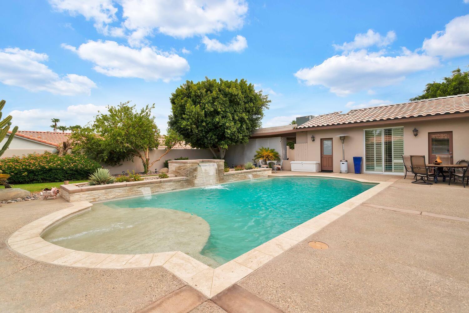 43920 Culebra Lane Bermuda Dunes, CA 92203 - Photo 47 of 66 a view of outdoor space yard and swimming pool